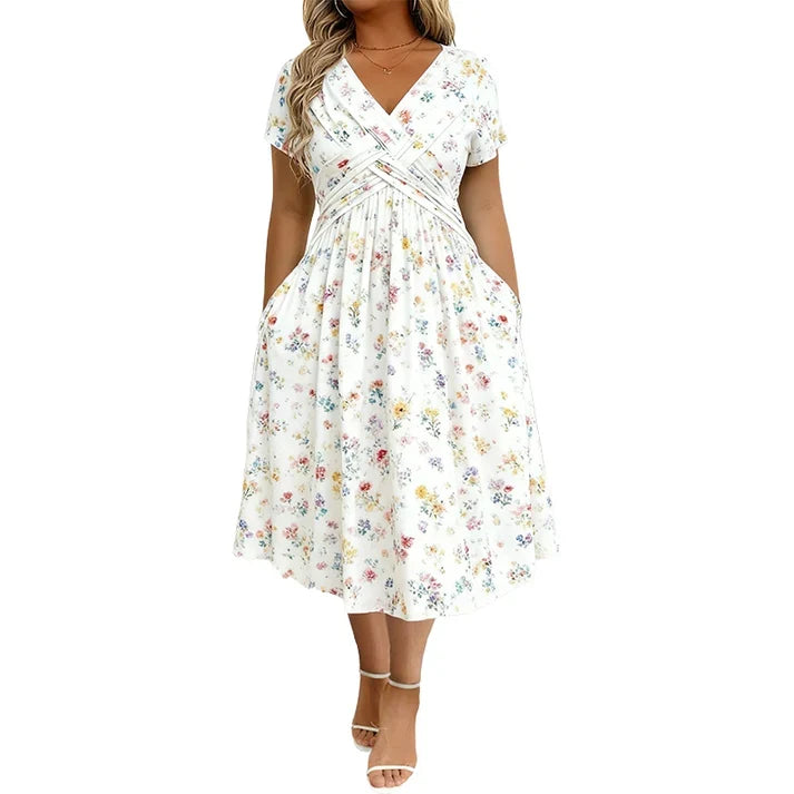 Floral V-neck dress with   a twist at the waist—   elegant and casual for   any occasion